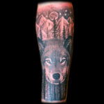 best realistic wolf landscape tattoo