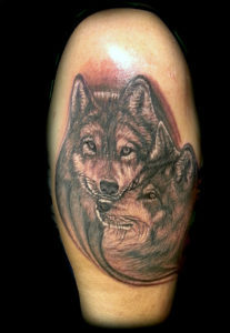 realistic wolves tattoo