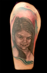 Daughter portrait tattoo