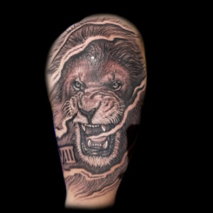 realistic lion tattoo