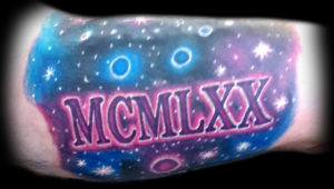 galaxy roman numerals tattoo