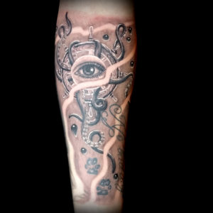 nautical eye ship wheel tattoo tentacles