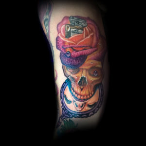 skull and rose tattoo for girls