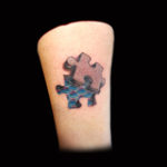 3d puzzle piece tattoo