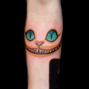 alice in wonderland cat tattoo